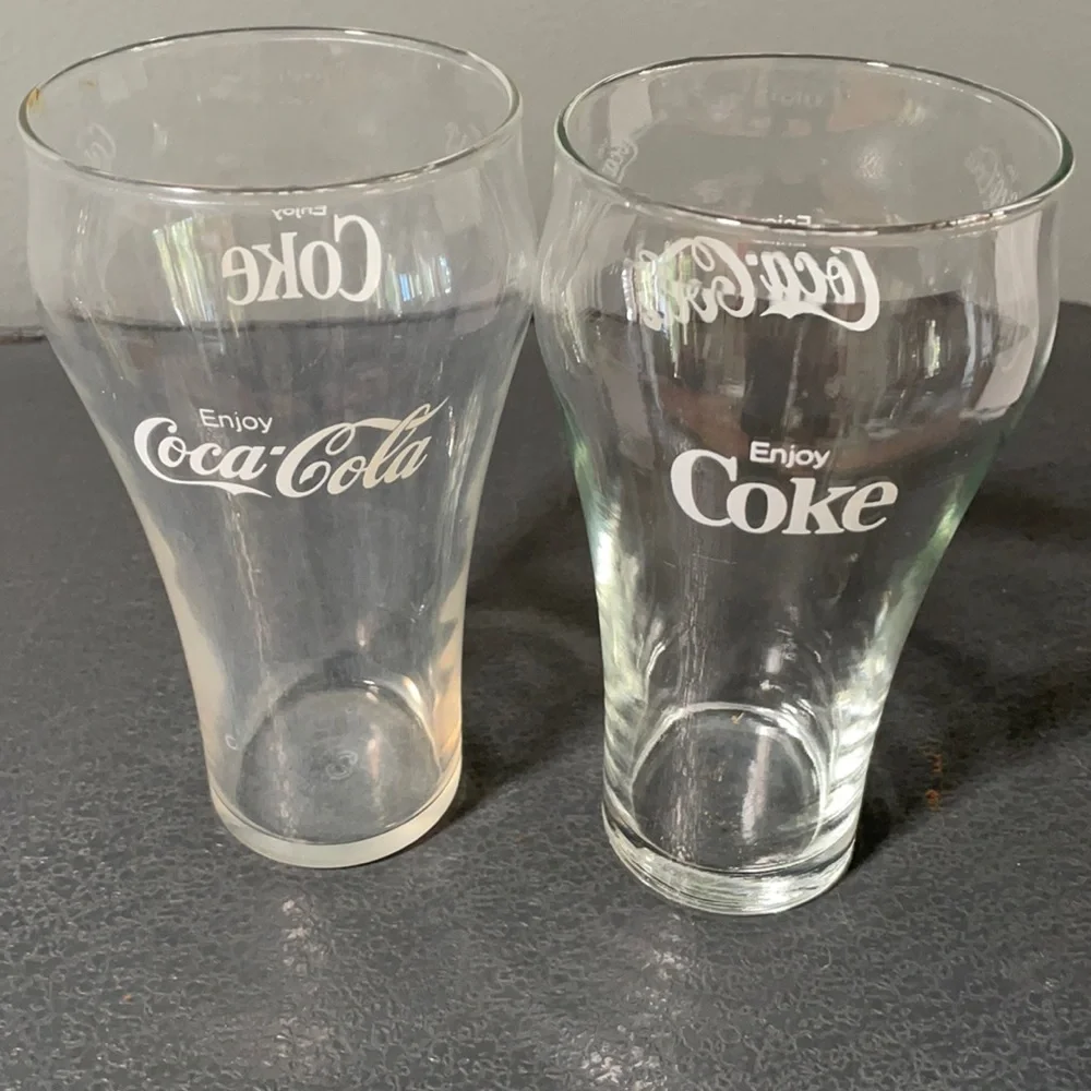 2 Coca Cola collectible glasses